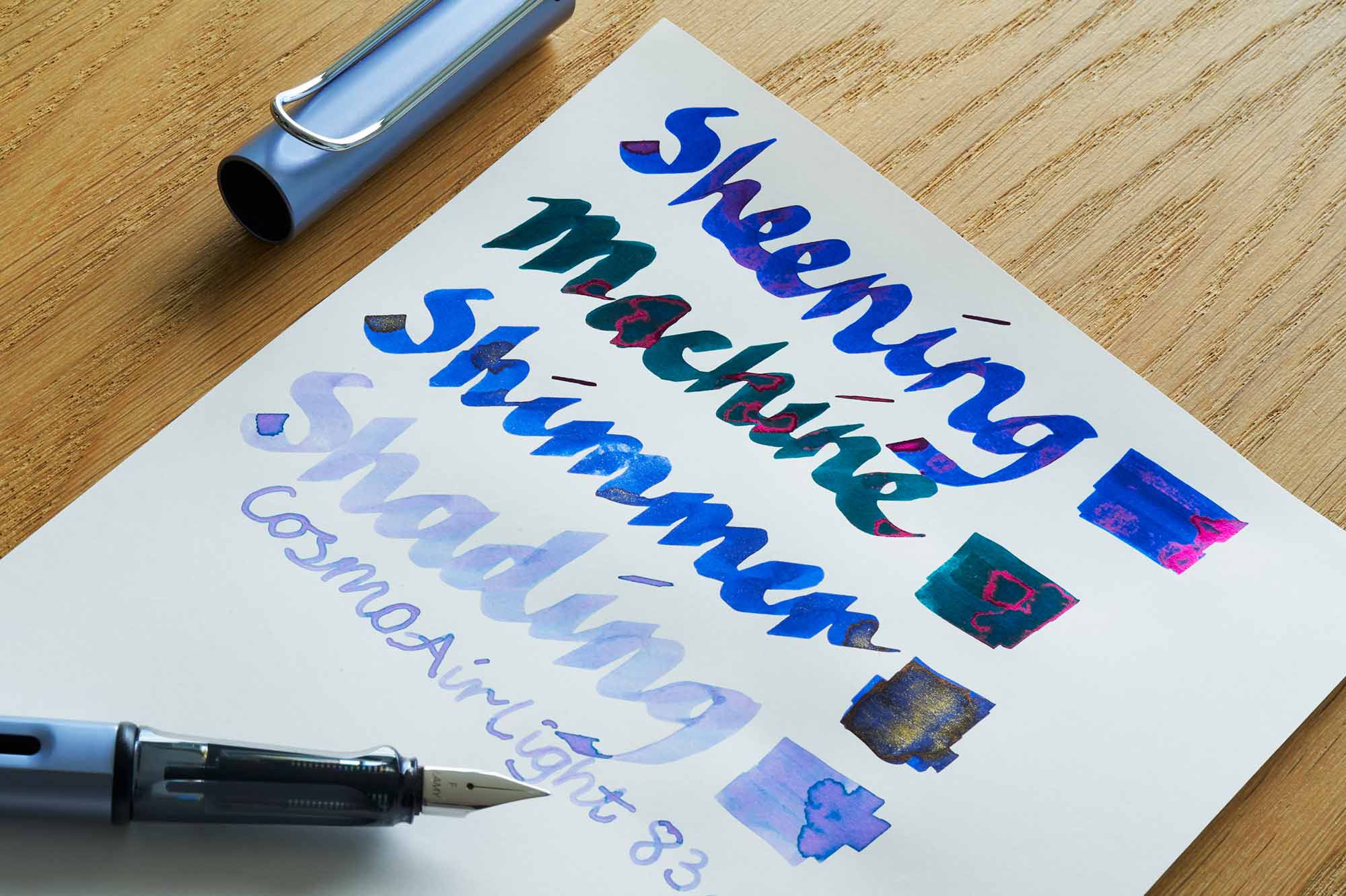 the paper mind cosmo air light fountain pen friendly notebook paper with sheening shimmering and shading inks and a lamy al-star fountain pen