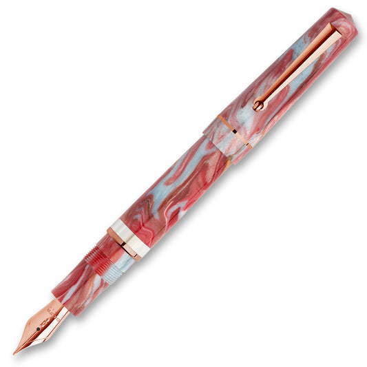 Marbled pink and white fountain pen with rose gold accents on a white background Delta Duna Ghibli Red Fountain Pen Posted made in Italy