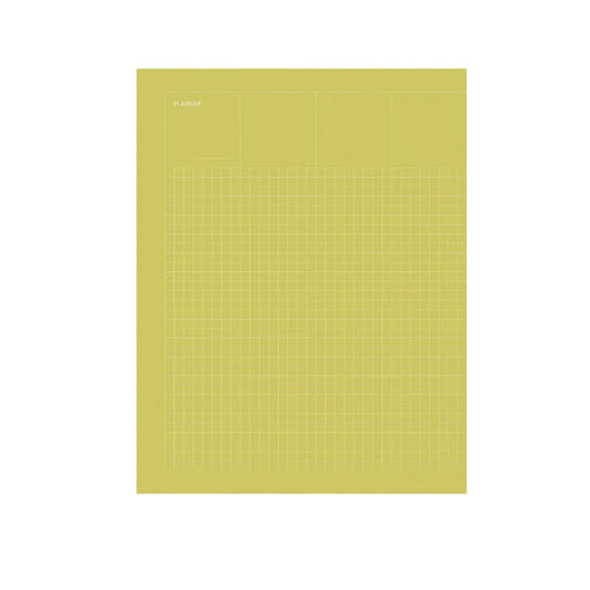 A minimalist yellow grid notepad or planner page standing upright on a light gray background. Grid Undated Planner - Fountain Pen Friendly Planner - Fresh Green
