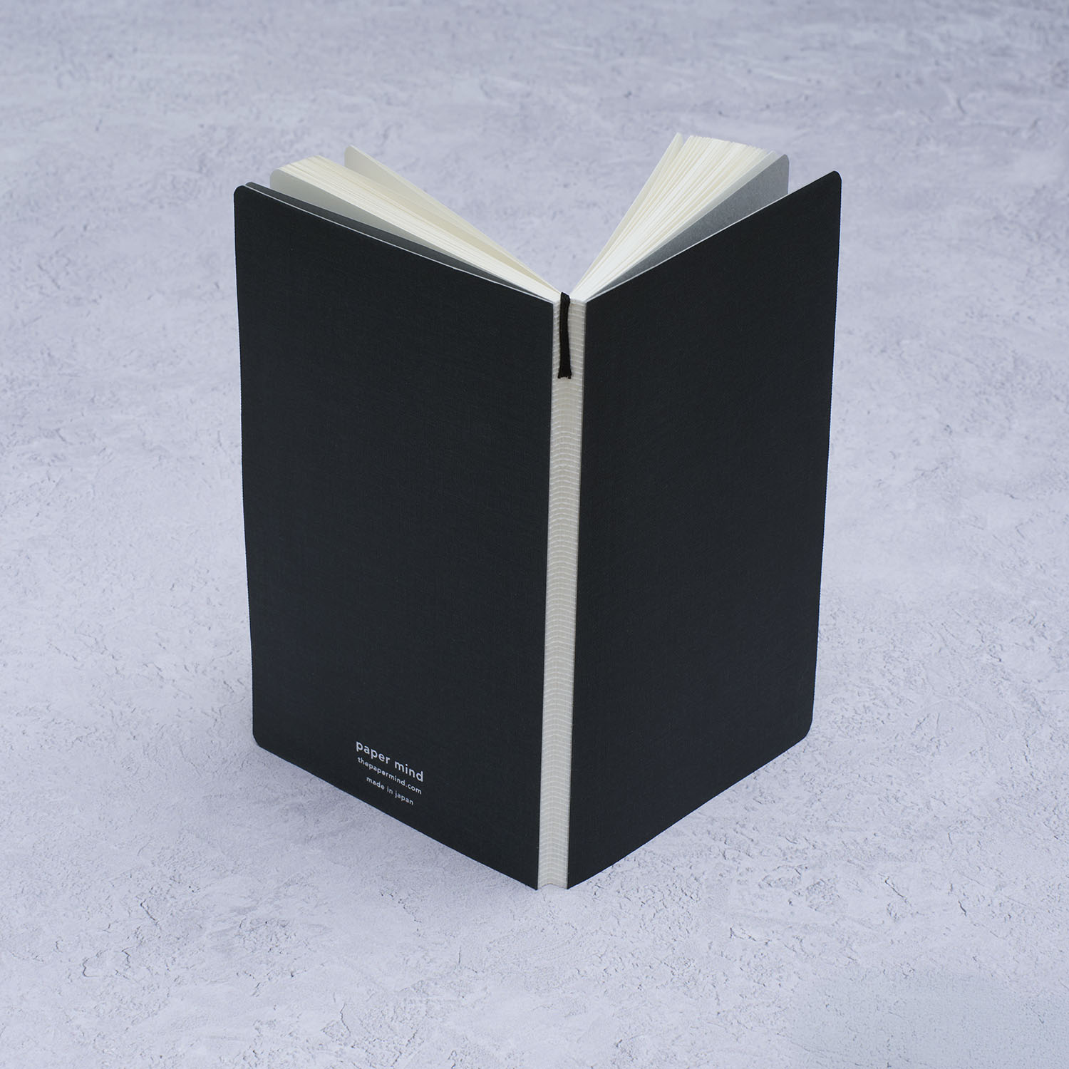 The Paper Mind Meringue Paper Notebook B6 Slim,  Notebook for Fountain Pens, dot grid, black cover spine