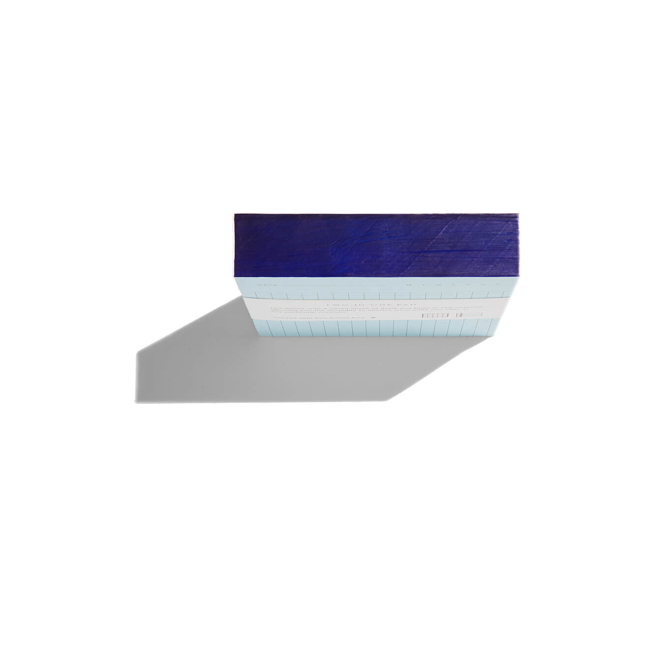 Top edge of 2-in-1 Notepad in Blue and Green by Before Breakfast. Grid and ruled sheets. Made in England and fountain pen friendly.