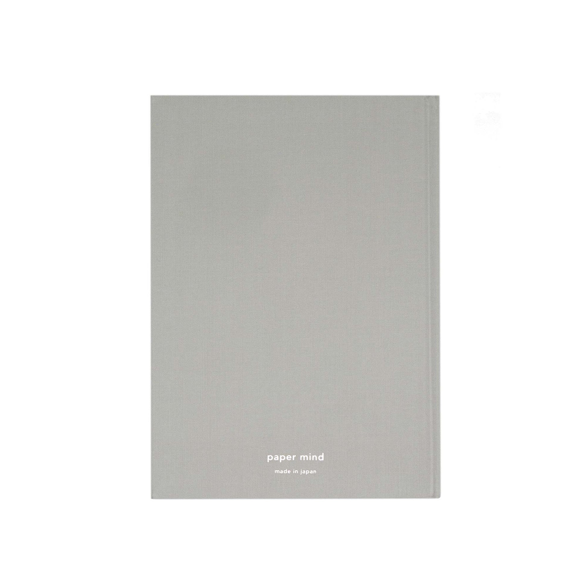 The Paper Mind Cosmo Air Light Hardcover Journal. Fountain pen friendly Journal. Light Gray Japanese Linen Cover. back cover with The Paper Mind Silver foil logo.